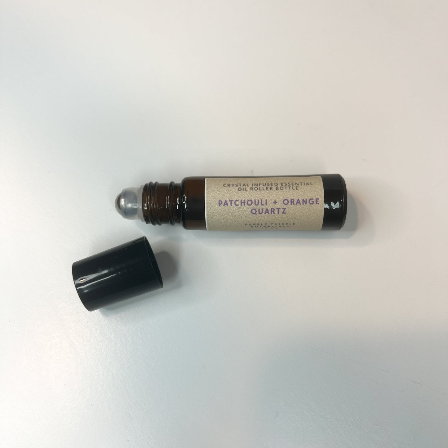 Patchouli + Orange Quartz Crystal Infused EO Roller Bottle